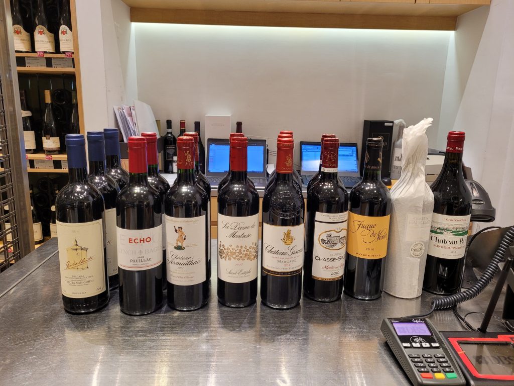 Wine bottles on table.